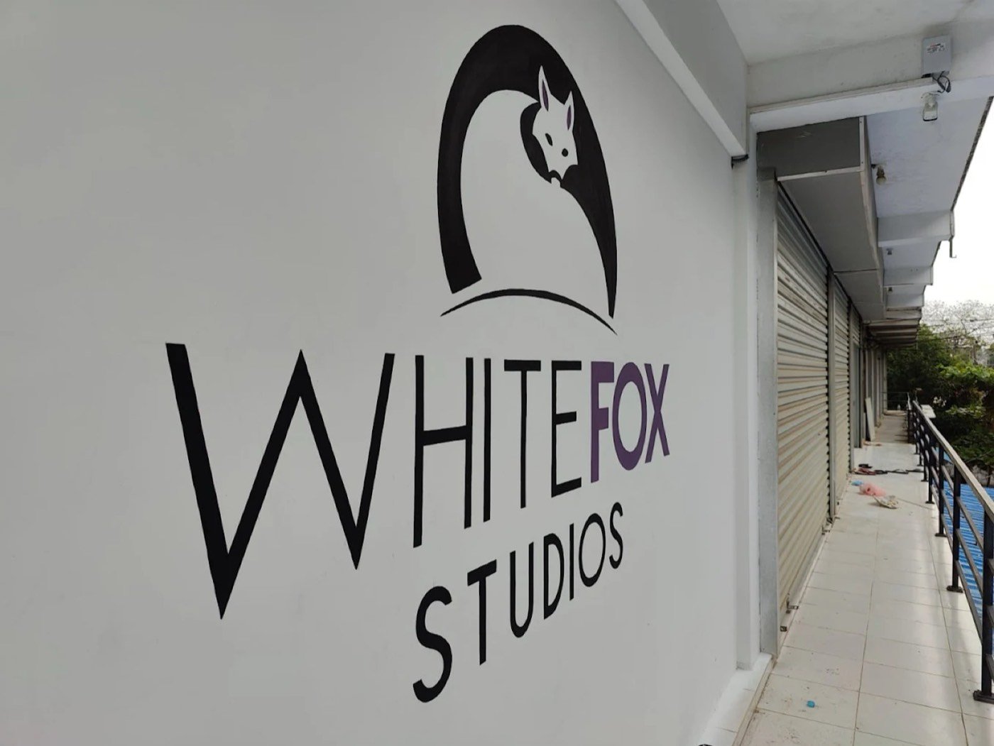 The WhiteFox Studios logo on the studio wall
